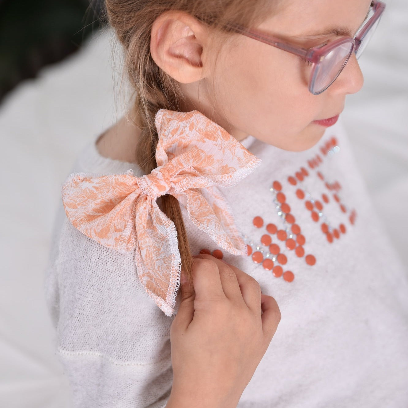 Orange buckle on alligator clip